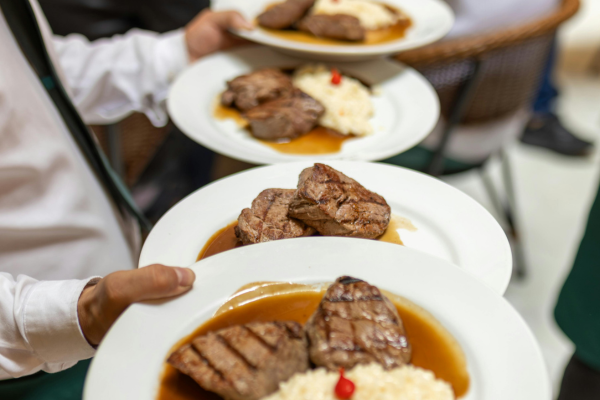 Waiter-Serving-Beef-Dish.png