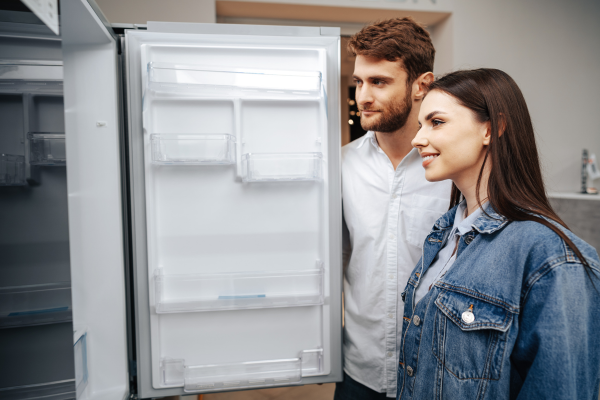Couple-Looking-at-Refrigerator.png